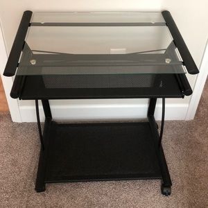 Desk for computer. Could be multipurpose.